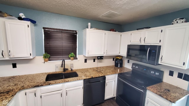 6637 Larkwood Ct, Indianapolis, IN 46241 - kitchen featuring dishwasher, black range with electric cooktop, a sink, white cabinets, and a textured ceiling