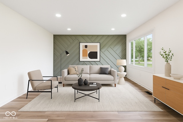 8933 W 1050 S, Fortville, IN 46040 - living area with an accent wall, recessed lighting, baseboards, and light wood finished floors