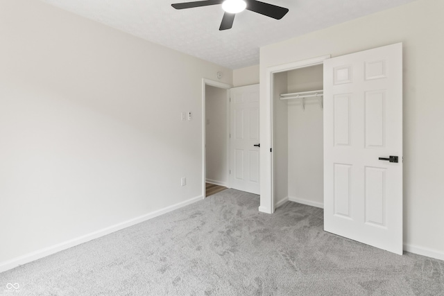 8933 W 1050 S, Fortville, IN 46040 - unfurnished bedroom featuring carpet, baseboards, a closet, and ceiling fan