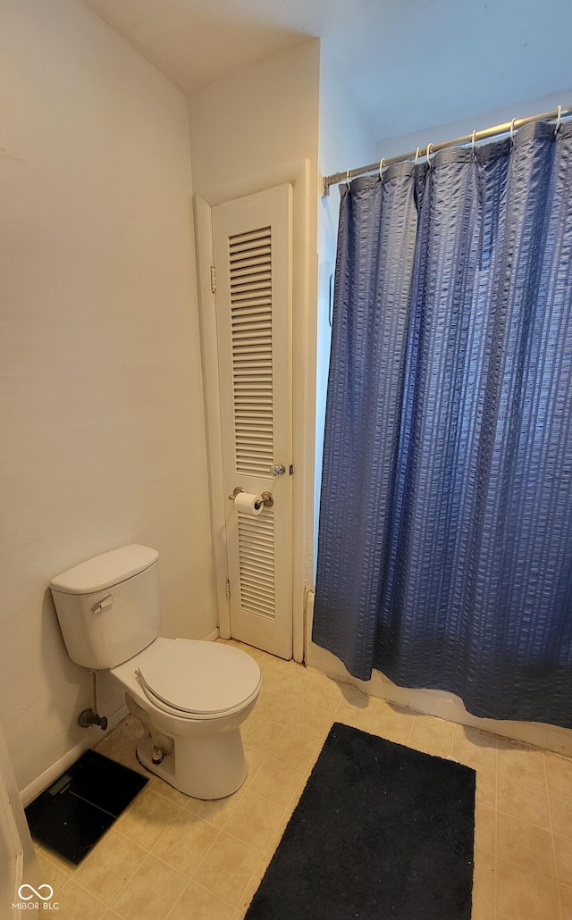 126 W W Blvd, Kokomo, IN 46902 - full bathroom featuring toilet, tile patterned floors, and curtained shower