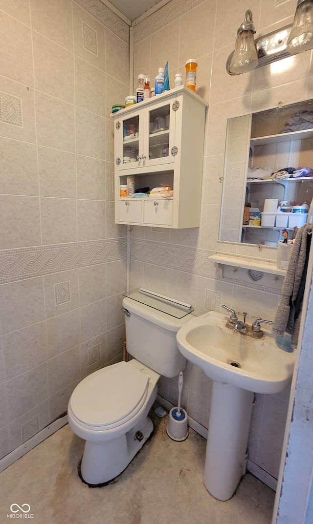 126 W W Blvd, Kokomo, IN 46902 - bathroom with tile walls and toilet