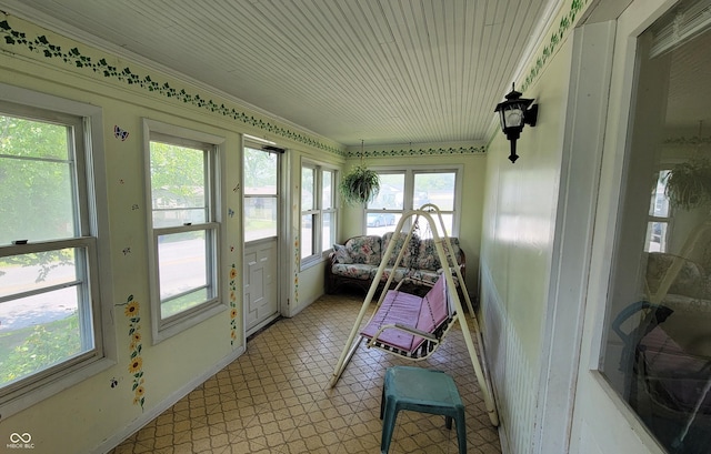 126 W W Blvd, Kokomo, IN 46902 - sunroom featuring tile patterned floors, wooden ceiling, and baseboards