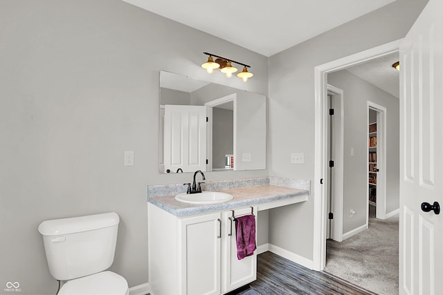 158 Handley St, Indianapolis, IN 46222 - bathroom featuring vanity, baseboards, and toilet