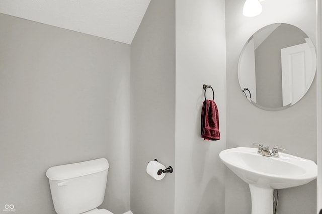 158 Handley St, Indianapolis, IN 46222 - half bathroom with toilet and vaulted ceiling