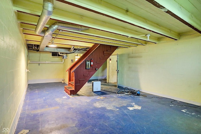 3215 E Edgewood Ave, Indianapolis, IN 46227 - unfinished basement featuring stairs and concrete block wall