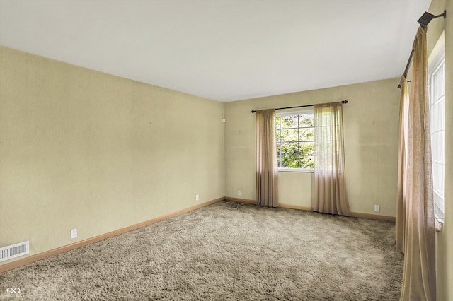 3215 E Edgewood Ave, Indianapolis, IN 46227 - carpeted empty room featuring baseboards