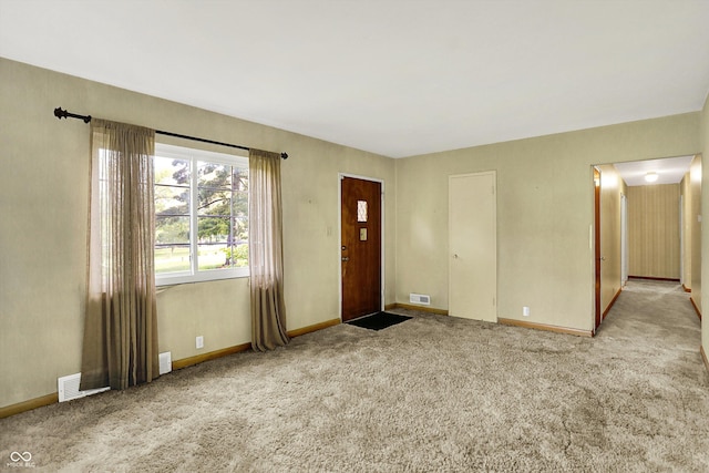 3215 E Edgewood Ave, Indianapolis, IN 46227 - carpeted foyer entrance with baseboards