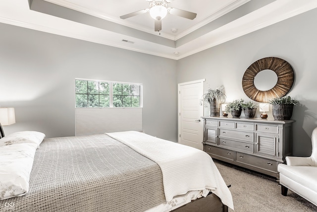3335 Guilford Ln, Plainfield, IN 46168 - bedroom featuring light carpet, ornamental molding, a tray ceiling, and ceiling fan