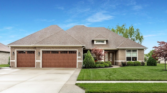 3335 Guilford Ln, Plainfield, IN 46168 - view of front facade featuring a garage, brick siding, driveway, a front yard, and a shingled roof