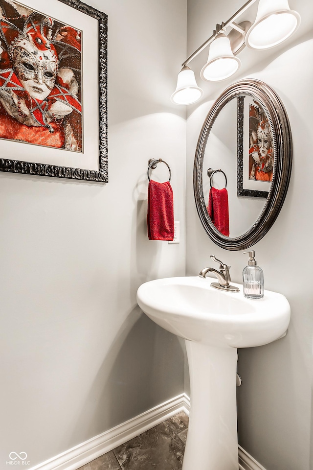 3335 Guilford Ln, Plainfield, IN 46168 - bathroom featuring baseboards and a sink