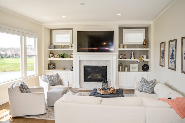 987 Oak Terrace Rd, Westfield, IN 46074 - living room featuring ornamental molding, a fireplace, wood finished floors, built in features, and recessed lighting