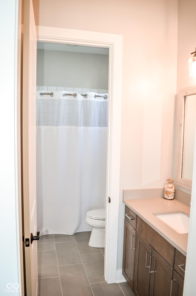 987 Oak Terrace Rd, Westfield, IN 46074 - bathroom with toilet, vanity, tile patterned floors, and a shower with shower curtain