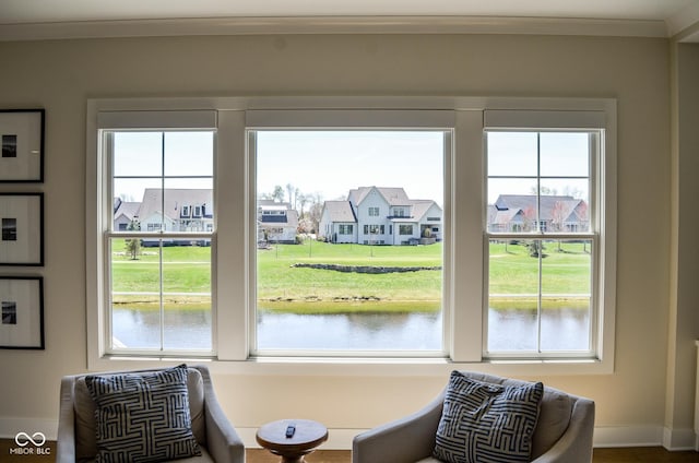 987 Oak Terrace Rd, Westfield, IN 46074 - living area with healthy amount of natural light, baseboards, ornamental molding, and a water view