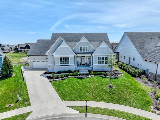 987 Oak Terrace Rd, Westfield, IN 46074 - view of front of property featuring driveway, a porch, a front lawn, and a garage