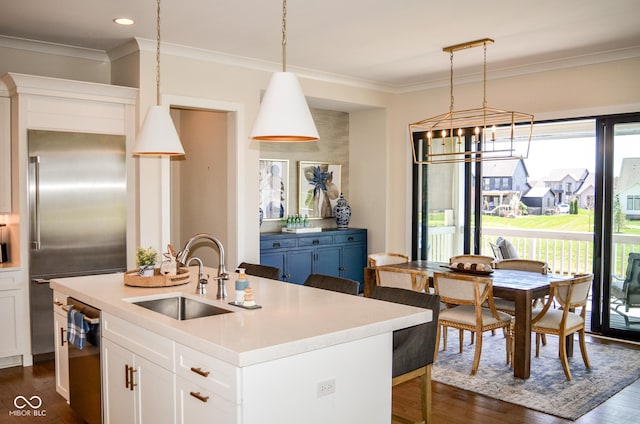 987 Oak Terrace Rd, Westfield, IN 46074 - kitchen with a sink, appliances with stainless steel finishes, ornamental molding, dark wood-style floors, and white cabinetry