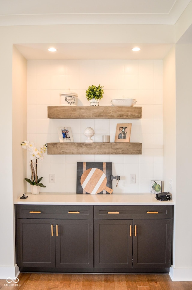 987 Oak Terrace Rd, Westfield, IN 46074 - bar with wood finished floors, baseboards, and recessed lighting