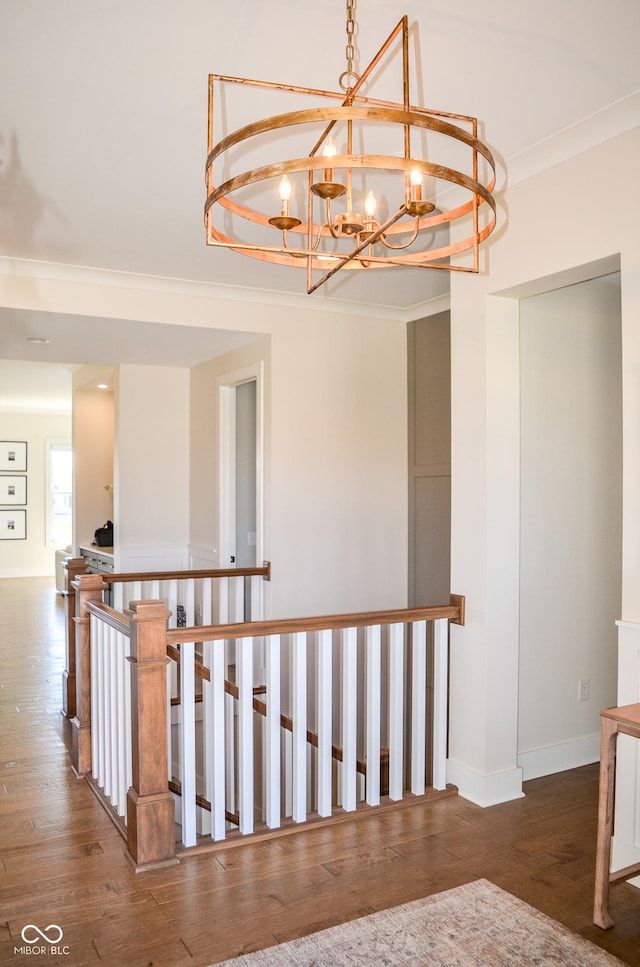 987 Oak Terrace Rd, Westfield, IN 46074 - staircase with a chandelier, ornamental molding, baseboards, and wood finished floors