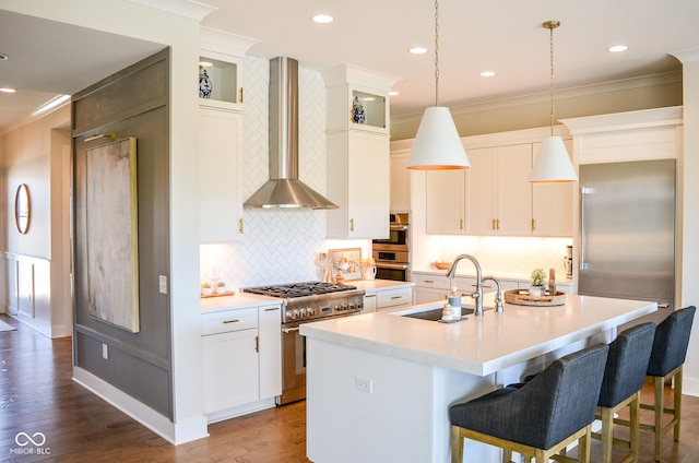 987 Oak Terrace Rd, Westfield, IN 46074 - kitchen with wall chimney range hood, stainless steel appliances, a sink, ornamental molding, and a center island with sink