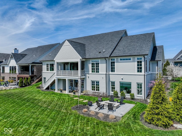 987 Oak Terrace Rd, Westfield, IN 46074 - rear view of property with a fire pit, a patio, a yard, roof with shingles, and stairway