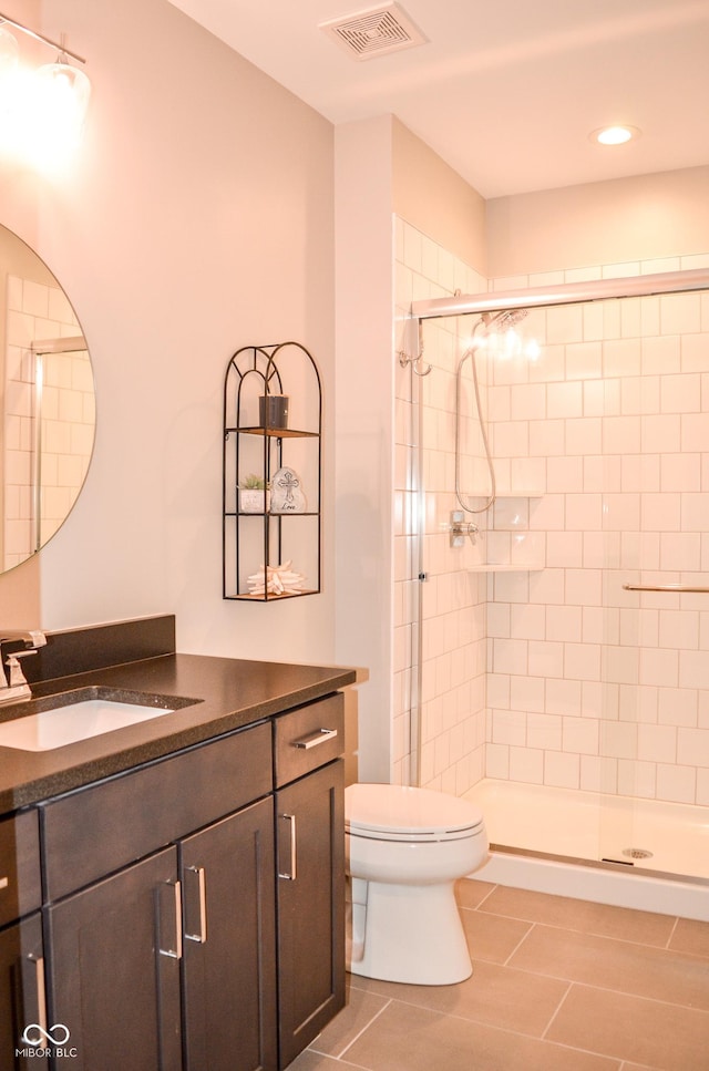 987 Oak Terrace Rd, Westfield, IN 46074 - full bath featuring tile patterned floors, vanity, toilet, a shower stall, and recessed lighting
