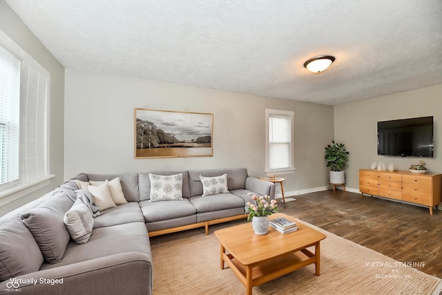 1730 N Graham Ave, Indianapolis, IN 46218 - living area with dark wood-style flooring and baseboards