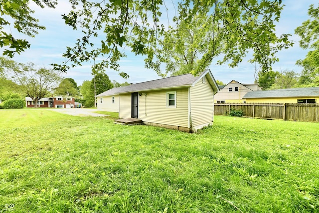 1730 N Graham Ave, Indianapolis, IN 46218 - back of house featuring an outdoor structure