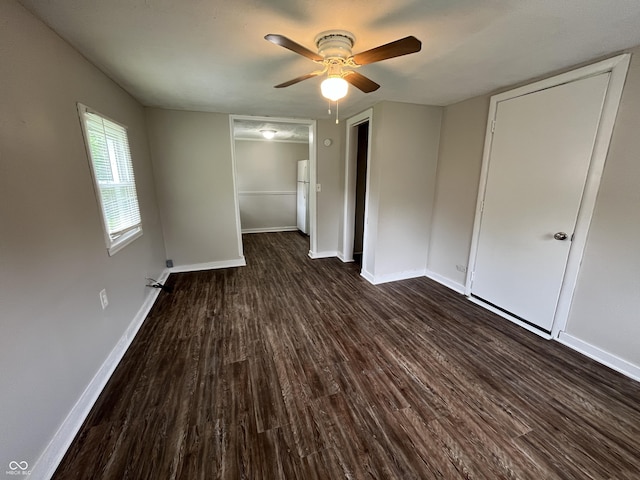 1730 N Graham Ave, Indianapolis, IN 46218 - unfurnished bedroom featuring dark wood finished floors and a ceiling fan