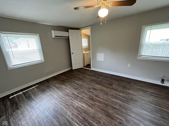 1730 N Graham Ave, Indianapolis, IN 46218 - unfurnished bedroom with a wall mounted air conditioner, wood finished floors, and ceiling fan