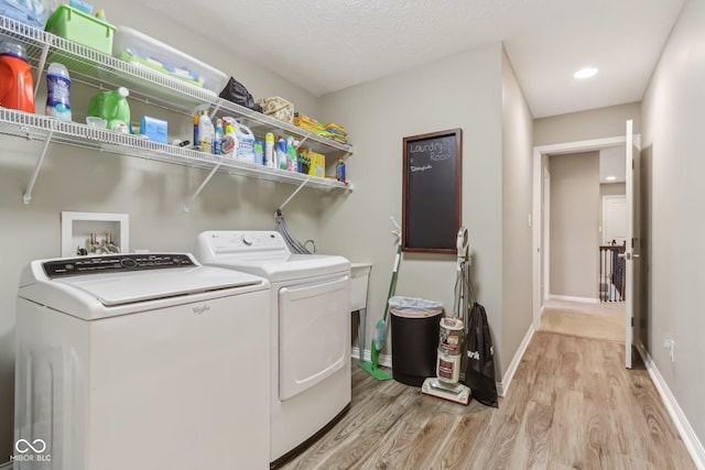 11844 Pine Meadow Cir, Fishers, IN 46037 - laundry area featuring washer and dryer, light wood-style floors, baseboards, and recessed lighting