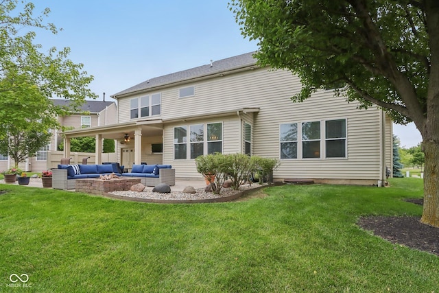 11844 Pine Meadow Cir, Fishers, IN 46037 - back of property featuring an outdoor living space with a fire pit, ceiling fan, a lawn, and a patio area