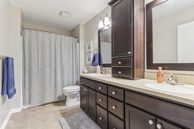 11844 Pine Meadow Cir, Fishers, IN 46037 - bathroom featuring tile patterned floors, double vanity, toilet, and a shower with curtain