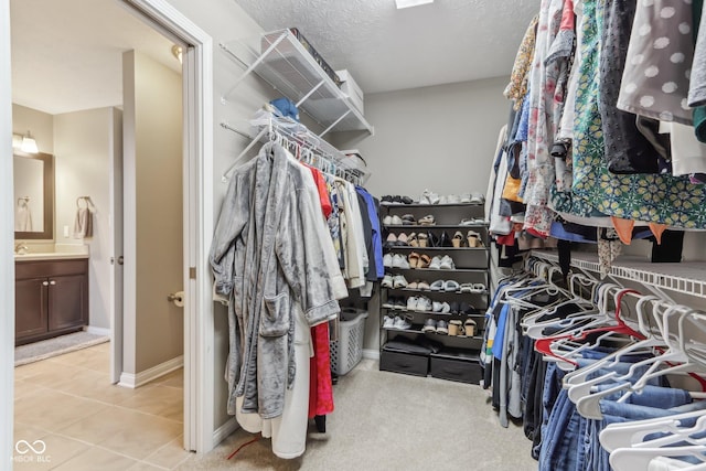 11844 Pine Meadow Cir, Fishers, IN 46037 - spacious closet with tile patterned flooring