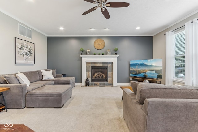 11844 Pine Meadow Cir, Fishers, IN 46037 - carpeted living area with recessed lighting, a ceiling fan, a tiled fireplace, ornamental molding, and baseboards