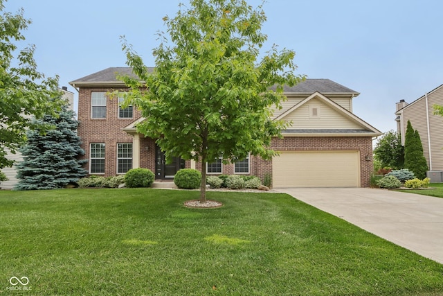 11844 Pine Meadow Cir, Fishers, IN 46037 - view of front facade with concrete driveway, a front lawn, brick siding, and an attached garage