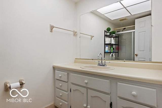 813 Boulder Rd, Indianapolis, IN 46217 - bathroom with vanity and a shower with door