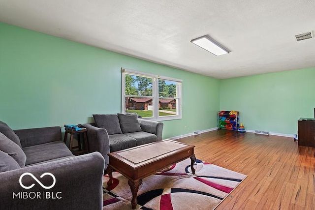 813 Boulder Rd, Indianapolis, IN 46217 - living area with hardwood / wood-style flooring and baseboards