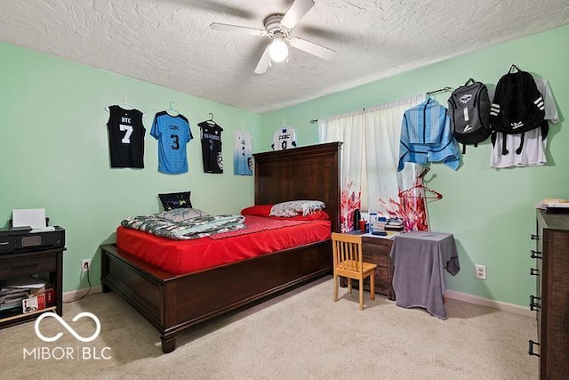 813 Boulder Rd, Indianapolis, IN 46217 - bedroom with a textured ceiling, carpet, baseboards, and ceiling fan
