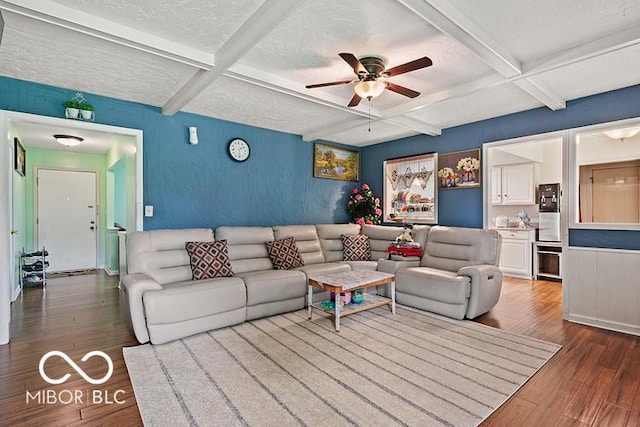 813 Boulder Rd, Indianapolis, IN 46217 - living area featuring wood finished floors, ceiling fan, beamed ceiling, coffered ceiling, and a textured ceiling