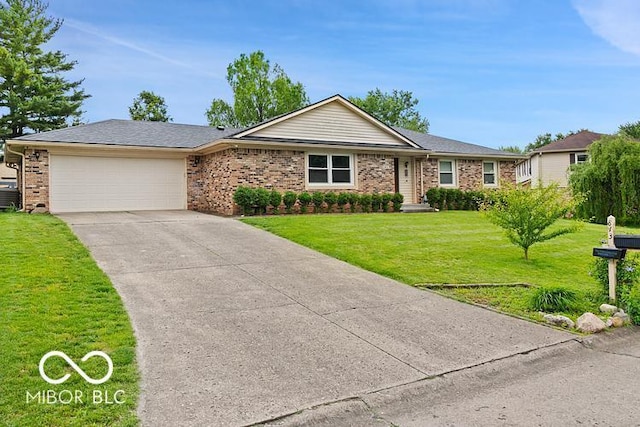 813 Boulder Rd, Indianapolis, IN 46217 - ranch-style house with a garage, driveway, a front lawn, and brick siding