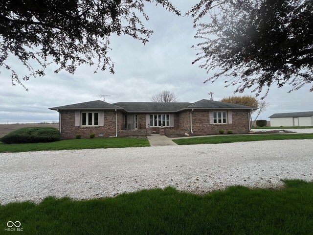 619 W 350 N, Covington, IN 47932 - ranch-style home with a front lawn and brick siding