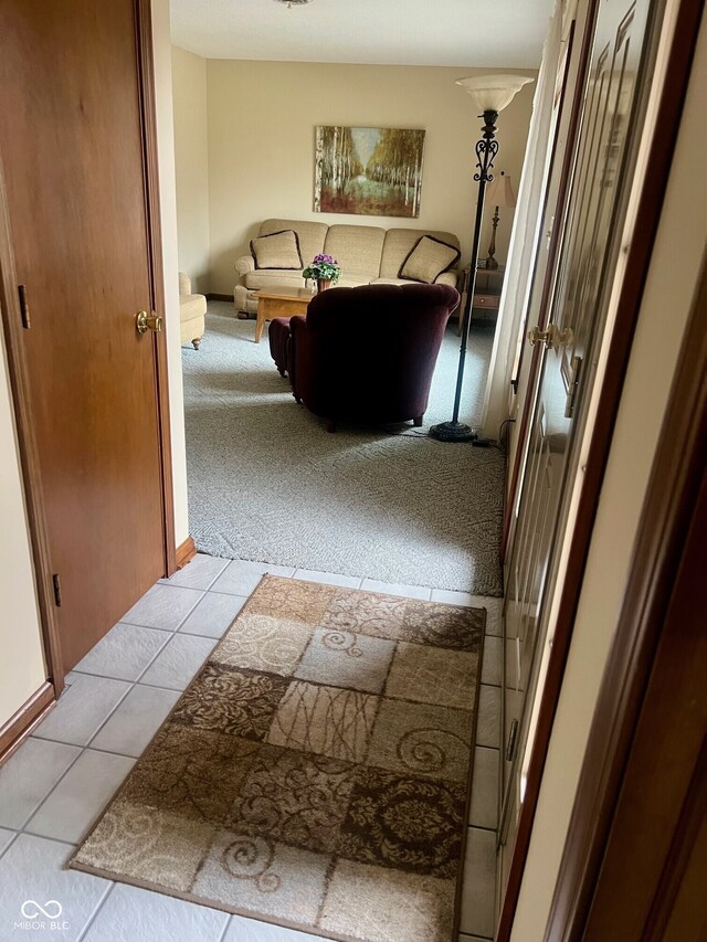 619 W 350 N, Covington, IN 47932 - corridor with light tile patterned floors and light colored carpet