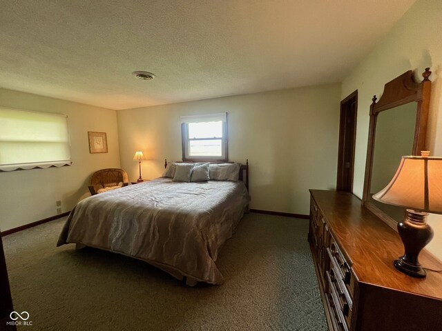 619 W 350 N, Covington, IN 47932 - bedroom featuring dark colored carpet, baseboards, and a textured ceiling