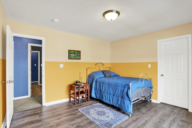 442 Mozart Dr, Greenfield, IN 46140 - bedroom featuring wood finished floors and baseboards
