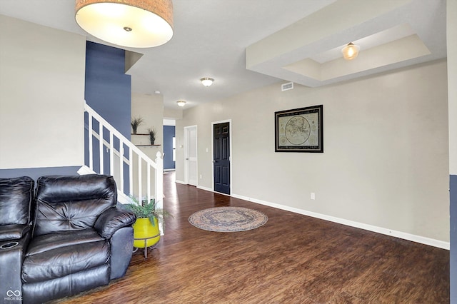 442 Mozart Dr, Greenfield, IN 46140 - living room with stairs, wood finished floors, and baseboards