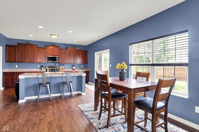 442 Mozart Dr, Greenfield, IN 46140 - dining space featuring dark wood finished floors, baseboards, and recessed lighting