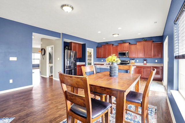 442 Mozart Dr, Greenfield, IN 46140 - dining space featuring baseboards, dark wood-type flooring, and recessed lighting