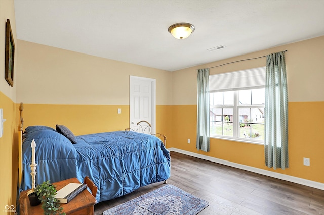 442 Mozart Dr, Greenfield, IN 46140 - bedroom featuring wood finished floors and baseboards