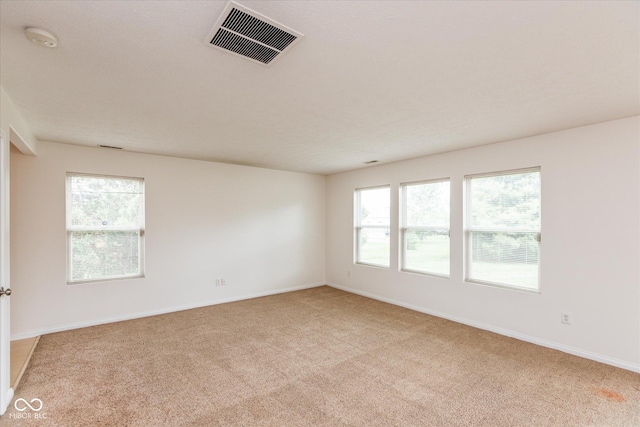 163 Clear Branch Dr, Brownsburg, IN 46112 - empty room featuring light colored carpet, a smoke detector, and baseboards