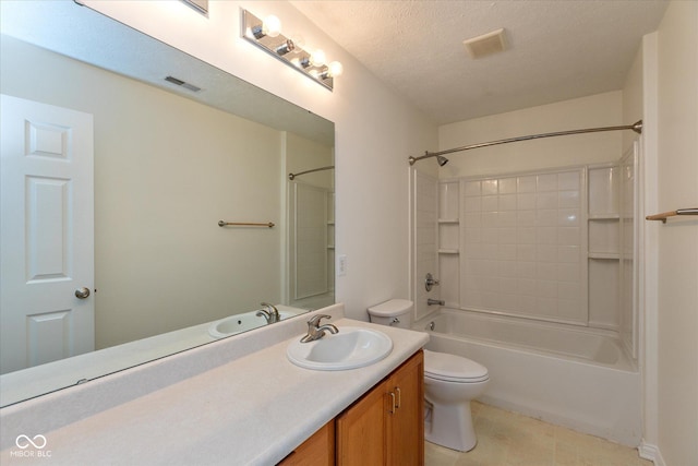 163 Clear Branch Dr, Brownsburg, IN 46112 - bathroom with toilet, vanity, tub / shower combination, a textured ceiling, and tile patterned flooring