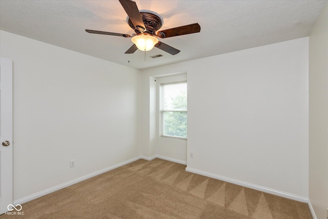 163 Clear Branch Dr, Brownsburg, IN 46112 - spare room featuring light carpet, baseboards, and ceiling fan